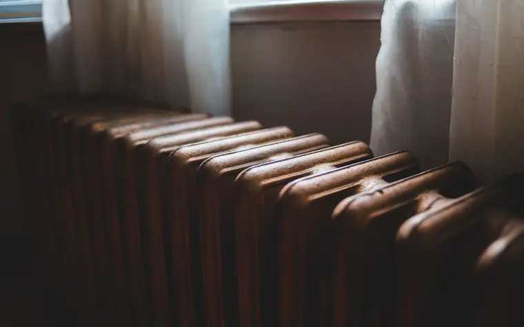 A radiator under a window in a family home