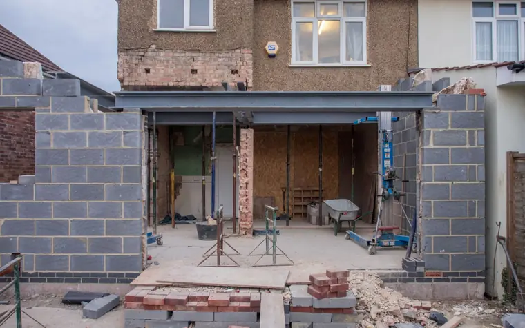 A house with a rear extension being built