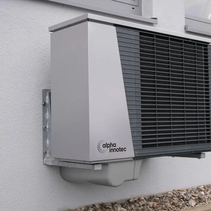 A wall-mounted air source heat pump outdoor unit